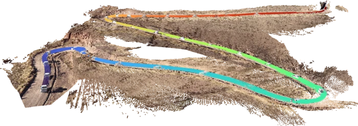 ARROW’s 4D reconstruction of a car travelling along a winding road, with a colored motion track